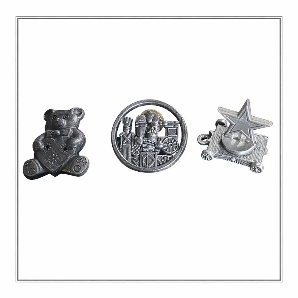 2 Pewter collectibles Hallmark pins, 1 pewter Collectible Dallas Cowboy Star